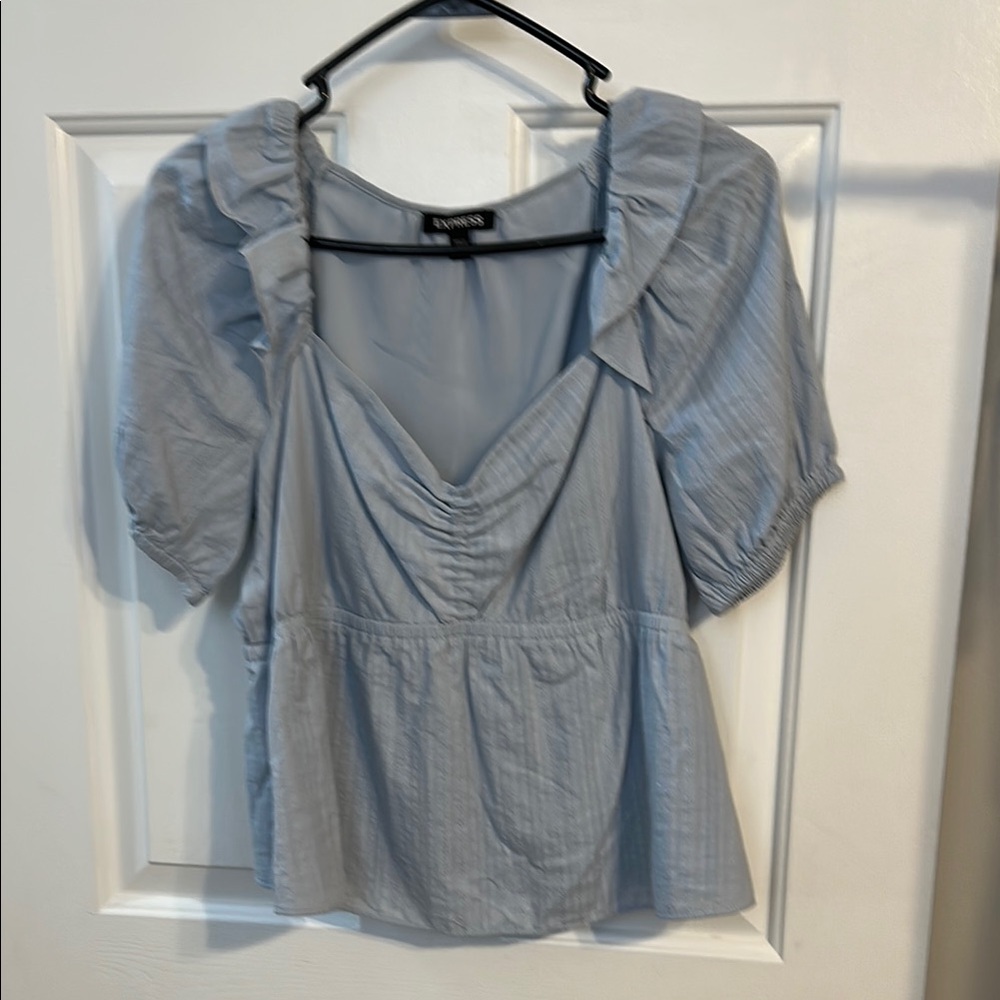 Express babydoll style top in light blue. Size medium.